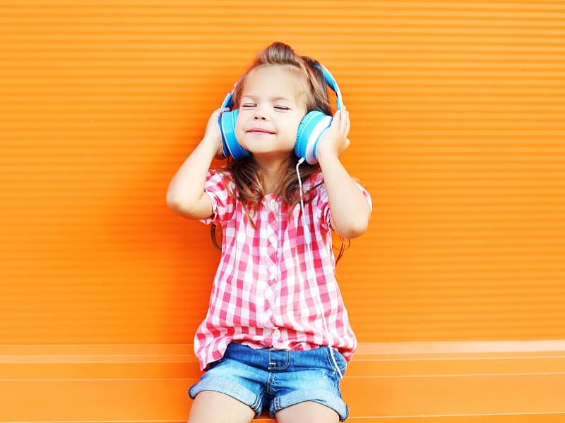 girl with blue headphones
