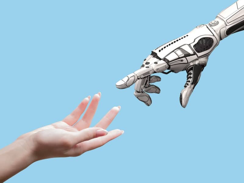 human and robot hand 